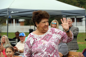 Former Commissioner Julia W. Gouge waves to the crowd